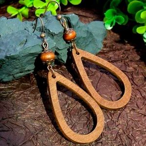 Brown pierced teardrop hanging earring